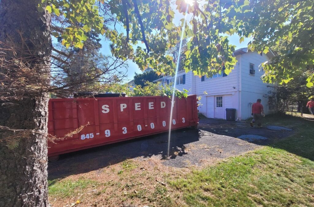 Central Valley roll-off dumpster being delivered