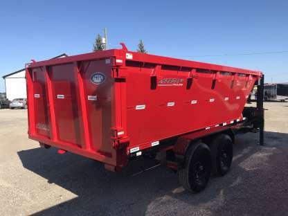 Various sizes of Speedy Dumpsters lined up for service